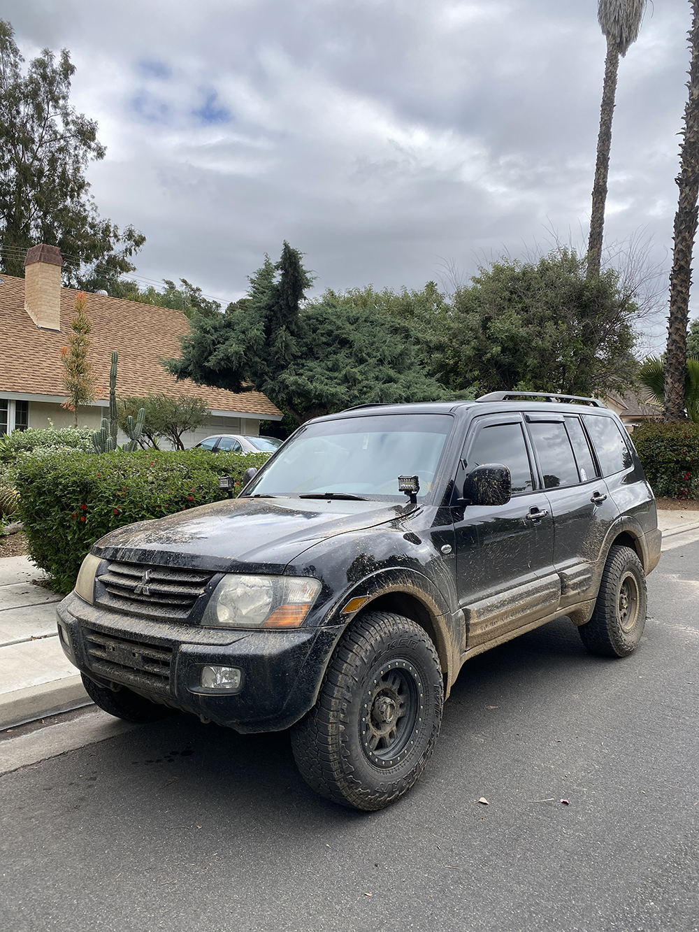 Mitsubishi Montero suspension lift KYB Gas A-Just Shocks